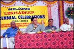 Dr L. Govinda Rao, Director, NIMH makes a point while Dr P. Hanumantha Rao of Sweekaar and others look on, click here to see large picture.