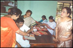 Smt Jamuna Ramana Rao observes vocational training in progress, click here to see large picture.