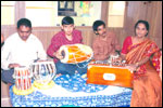 Smt Vijaya Lakshmi, Music Teacher giving lessons at the Group Residential Home LEKHA SAMARTH, click here to see large picture.