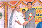 Sri K. Achyuta Rao Co-founder of LEKHADEEP and 1st President, being honoured by Sri C. V. Avadhani Principal AG [presentation of memento], during Decennial Celebrations, click here to see large picture.