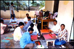 LEKHAKDEEP Trainees at work. Preparing calico ribbed office files, click here to see large picture.